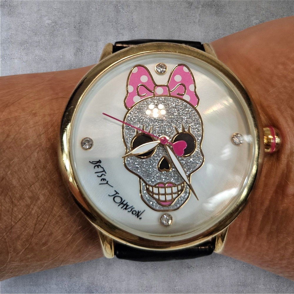 Betsey Johnson Women's Gold Tone Bling Skull Bow Rhinestone Watch Black Band A11